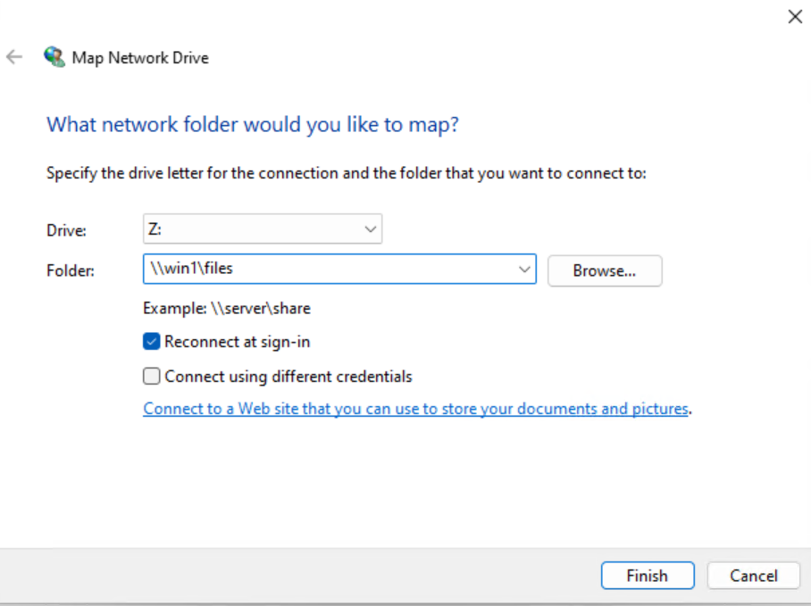 You can access a shared folder through a mapped network drive.